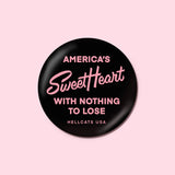 Black button with pink text reading, "America's SweetHeart with nothing to lose"