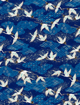 Pattern of white cranes on a blue background with geometric designs